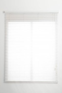 Modern window with open blinds in room