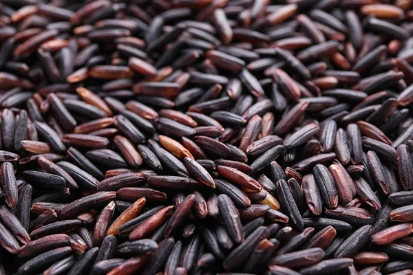 Uncooked Organic Brown Rice Background Closeup — 스톡 사진