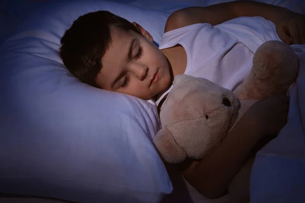 Little boy sleeping with teddy bear at home. Bedtime — 스톡 사진