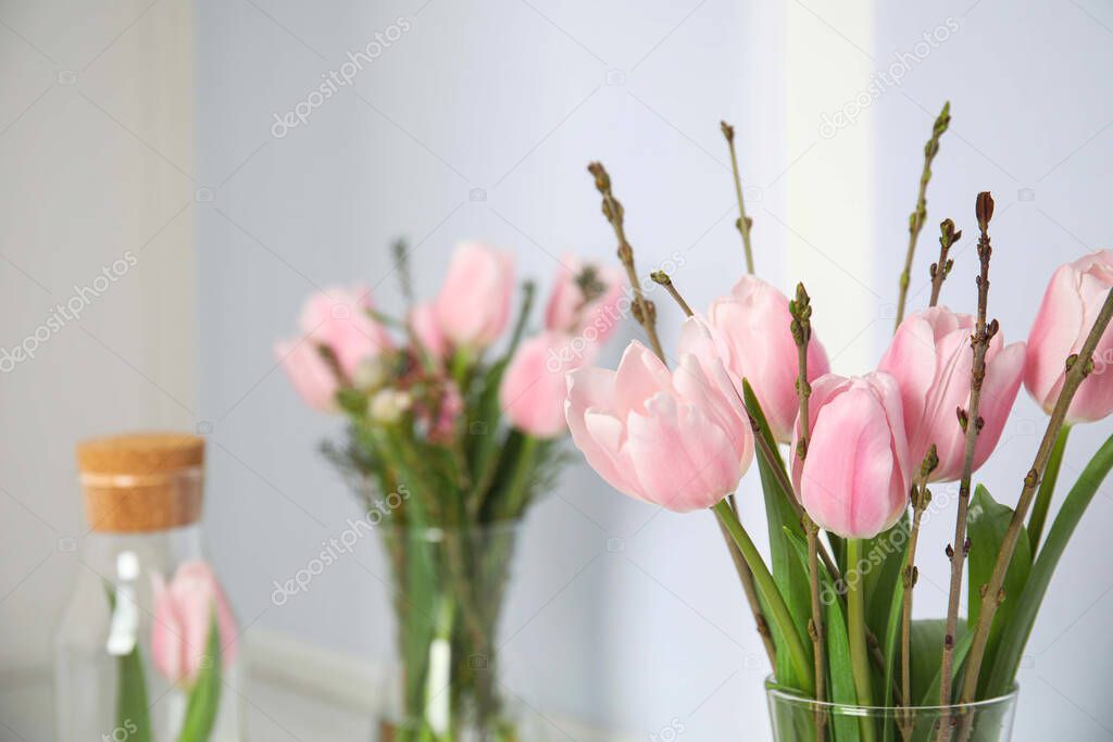 Beautiful bouquet of spring pink tulips on blurred background