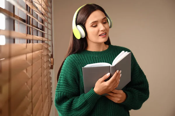 Young Woman Listening Audiobook Window Indoors — 스톡 사진