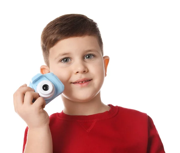 Kleine fotograaf met speelgoedcamera op witte achtergrond — Stockfoto