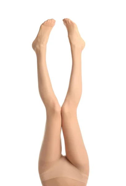 Frau trägt Strumpfhosen isoliert auf weißen, Nahaufnahme der Beine — Stockfoto