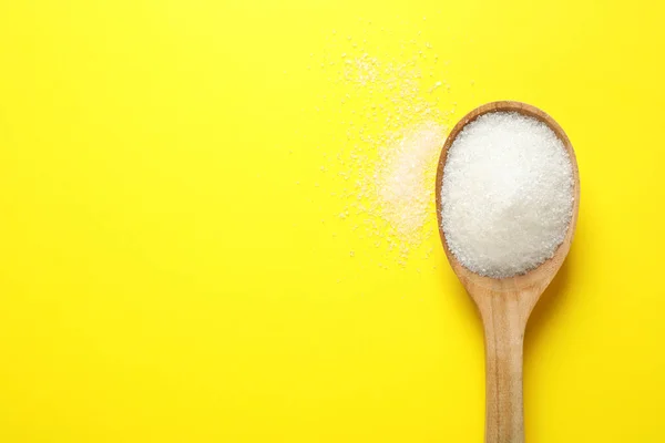 Granulated Sugar Spoon Yellow Background Top View Space Text — ストック写真