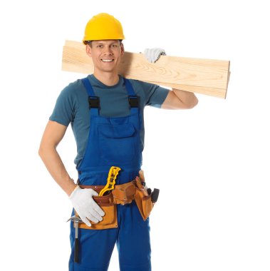 Handsome carpenter with wooden planks isolated on white