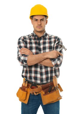 Handsome carpenter with tool belt isolated on white