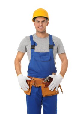 Handsome carpenter in hard hat isolated on white
