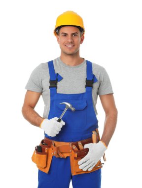 Handsome carpenter with hammer isolated on white
