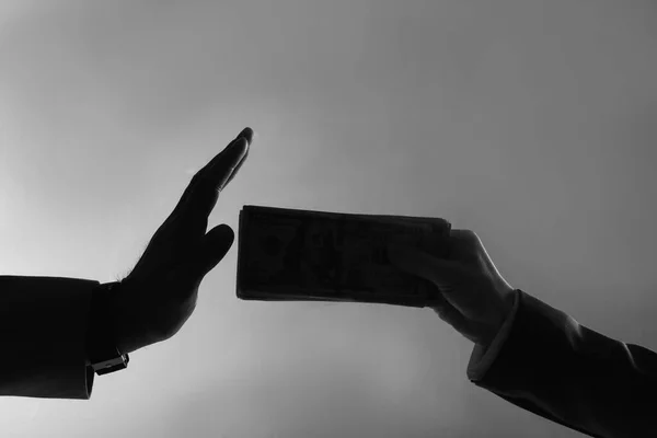 Silhouettes Man Refusing Take Bribe Business Woman Dark Grey Background —  Fotos de Stock