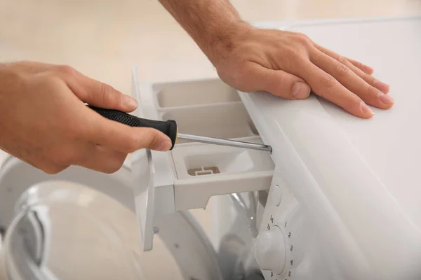 Professional Plumber Repairing Broken Washing Machine Closeup — Stock Photo, Image