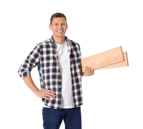 Handsome carpenter with wooden planks isolated on white — ストック写真