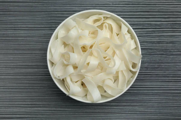 Tasty Rice Noodles Black Wooden Table Top View — 스톡 사진