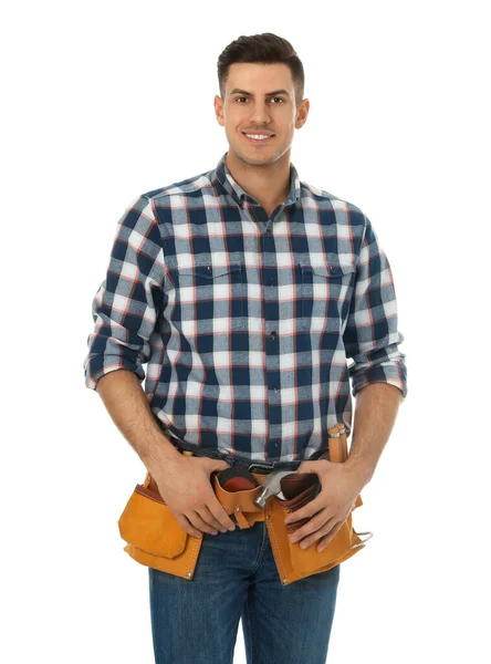 Handsome carpenter with tool belt isolated on white — Stockfoto