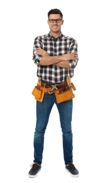 Handsome carpenter with tool belt isolated on white — ストック写真