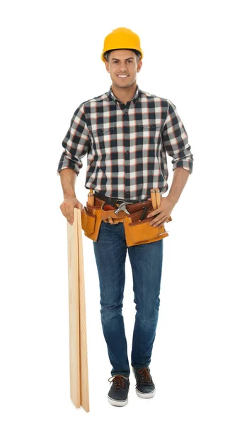 Handsome carpenter with wooden planks isolated on white — ストック写真