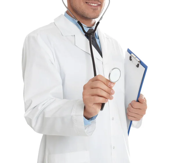 Doctor with clipboard and stethoscope on white background, close — 스톡 사진