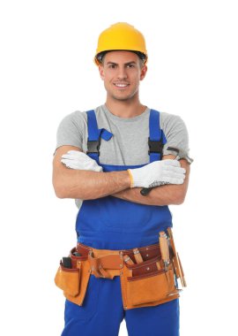 Handsome carpenter with hammer isolated on white