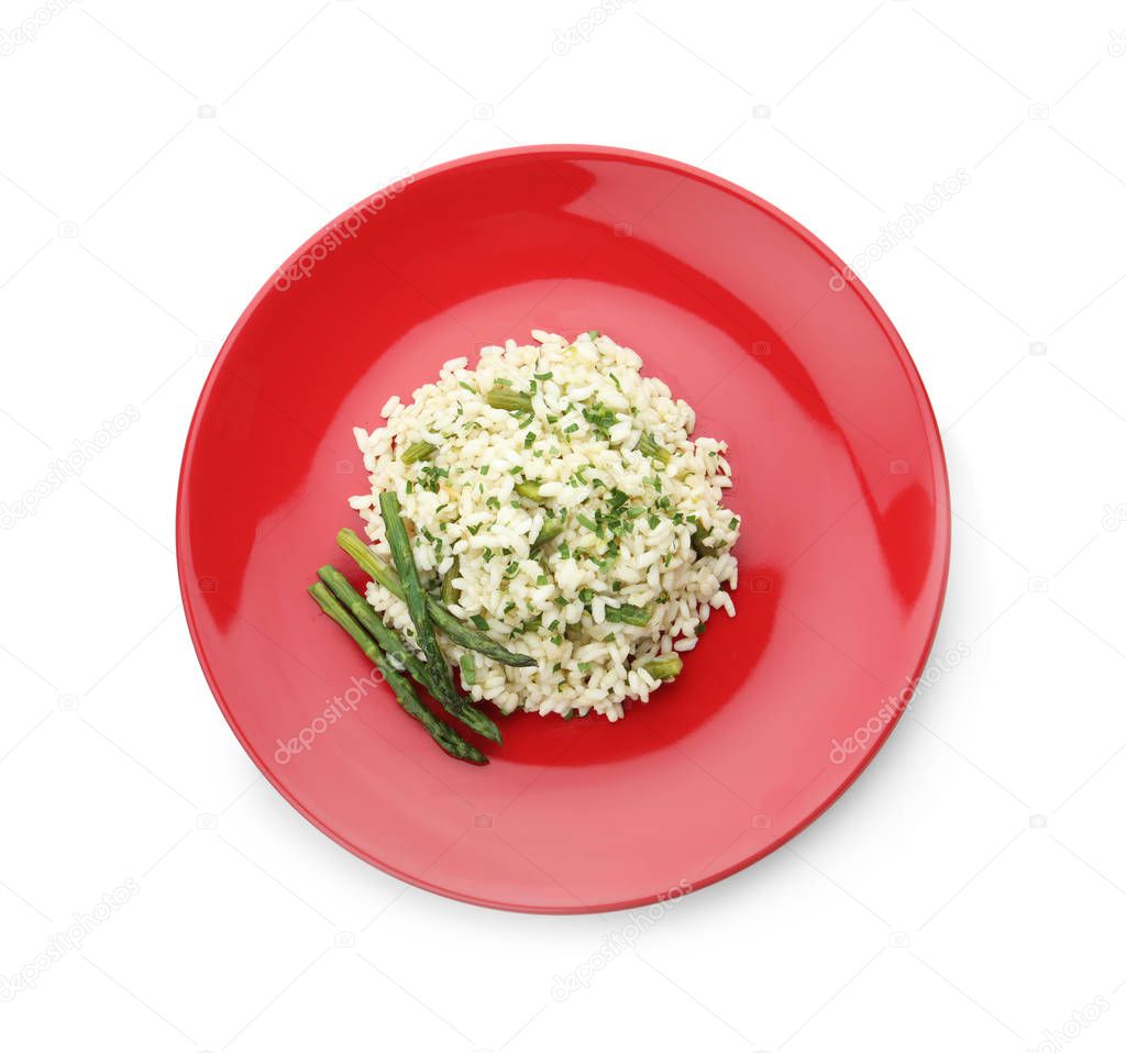 Delicious risotto with asparagus isolated on white, top view