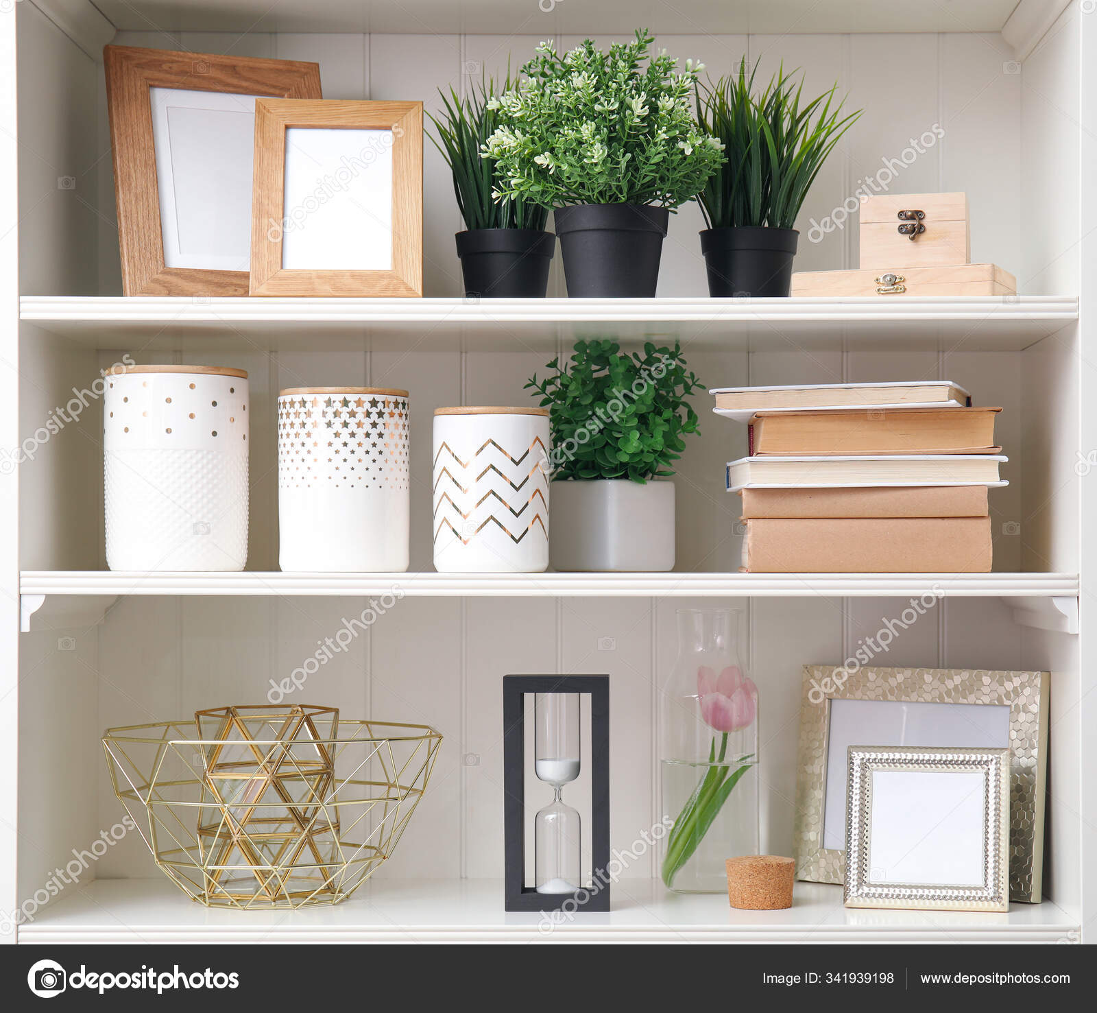 White Shelving Unit Plants Different Decorative Stuff Stock Photo by