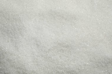 Arkaplan olarak granüle şeker yığını, üst görünüm