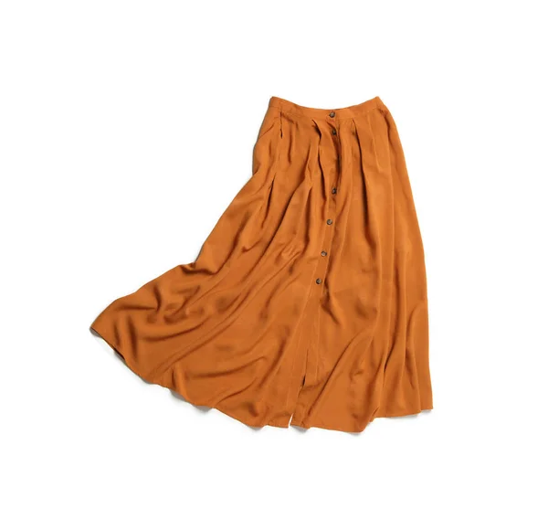 Elegancka długa pomarańczowa spódnica odizolowana na biało, widok z góry — Zdjęcie stockowe