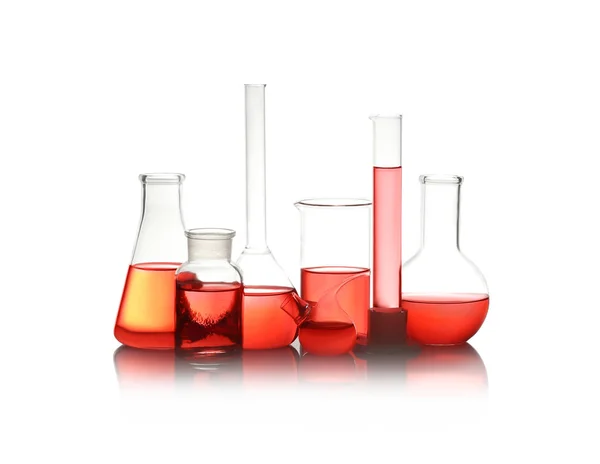 Different Laboratory Glassware Red Liquid Isolated White — Stockfoto