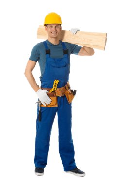 Handsome carpenter with wooden planks isolated on white