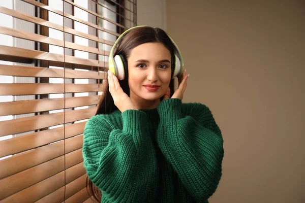 Young Woman Listening Audiobook Window Indoors — 스톡 사진