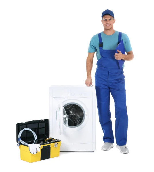 Repairman with clipboard and toolbox near washing machine on whi — Stock Photo, Image