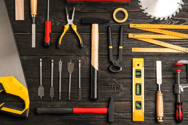 Flat Lay Composition Carpenter Tools Black Wooden Background — Stock Photo, Image