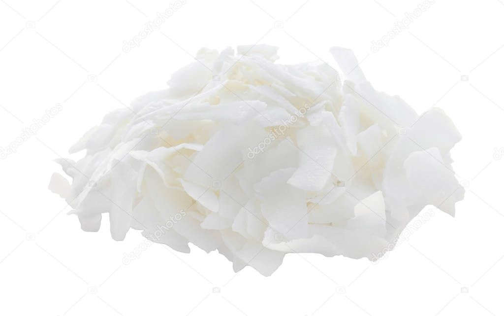 Heap of fresh coconut flakes isolated in white