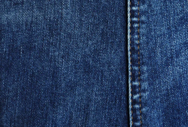 Texture de jeans bleu foncé comme fond, gros plan — Photo