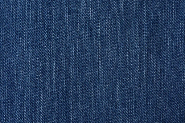 Textuur van blauwe jeans als achtergrond, close-up — Stockfoto