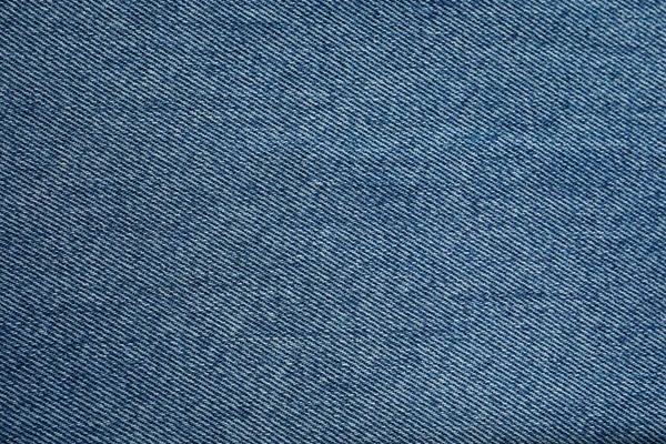 Texture di jeans blu come sfondo, primo piano — Foto Stock