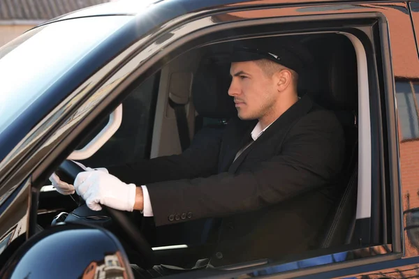 Professional driver in luxury car. Chauffeur service — Stock Photo, Image