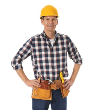 Handsome carpenter with tool belt isolated on white