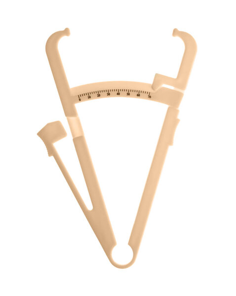 Plastic body fat caliper isolated on white