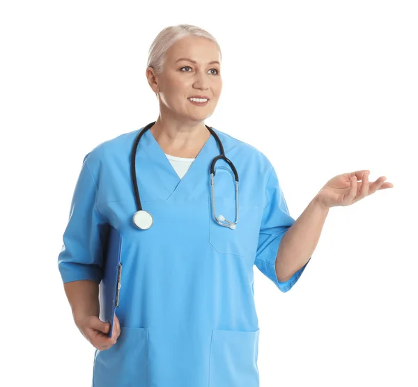 Mature doctor with clipboard and stethoscope on white background — Stock Photo, Image