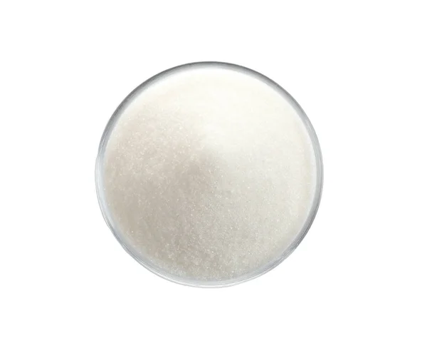 Azúcar granulado en tazón aislado en blanco, vista superior — Foto de Stock