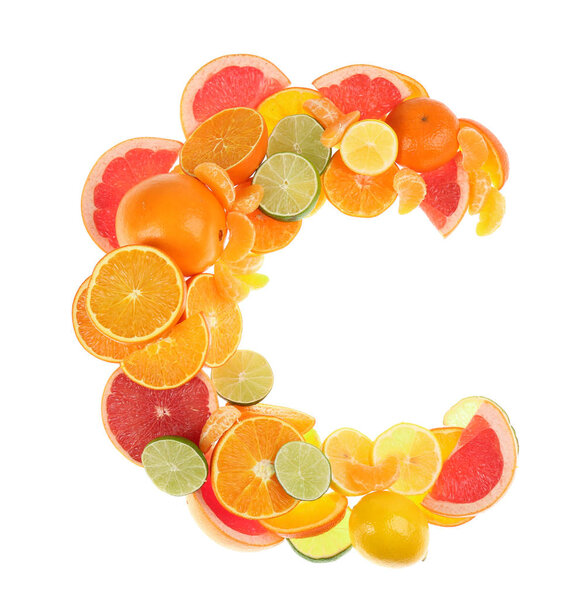 Letter C made with citrus fruits on white background as vitamin 