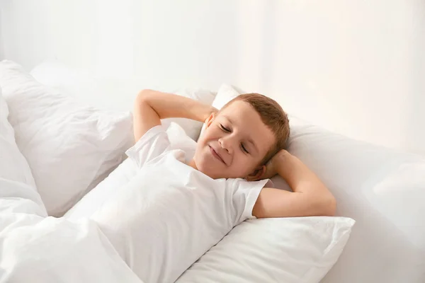 Cute little boy sleeping in bed at home — Stock Photo, Image