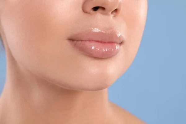 Young Woman Beautiful Full Lips Light Blue Background Closeup — 스톡 사진