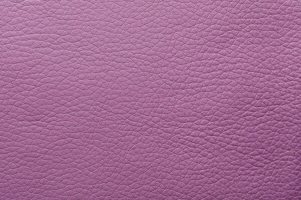 Texture of violet leather as background, closeup