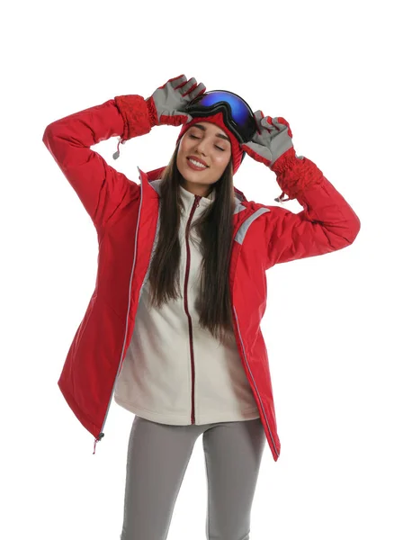 Vrouw draagt stijlvolle wintersportkleding op een witte achtergrond — Stockfoto