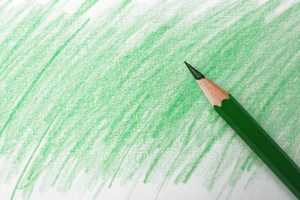 Lápiz Verde Sobre Hoja Papel Con Dibujo Vista Superior —  Fotos de Stock