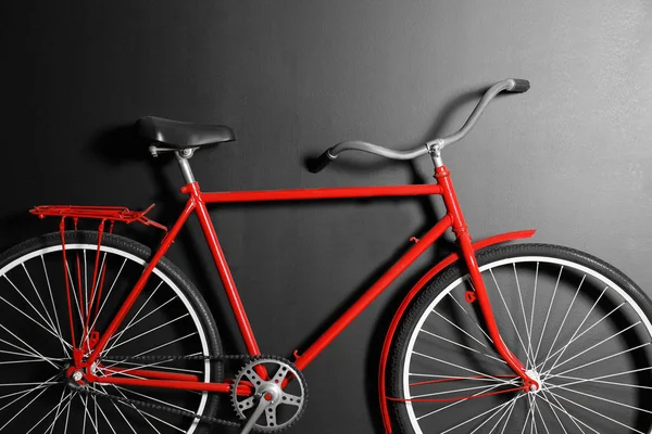 Red Bicycle Hanging Black Wall Closeup — Stock Photo, Image