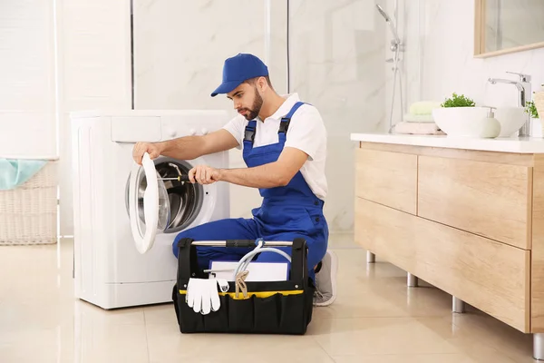 Professional Plumber Repairing Washing Machine Bathroom — 스톡 사진