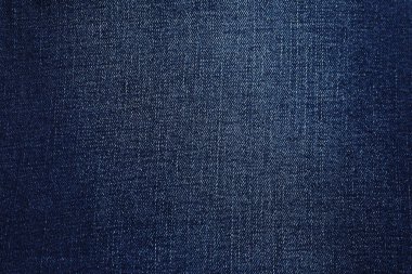 Arka plan olarak koyu mavi kotun dokusu, yakın plan