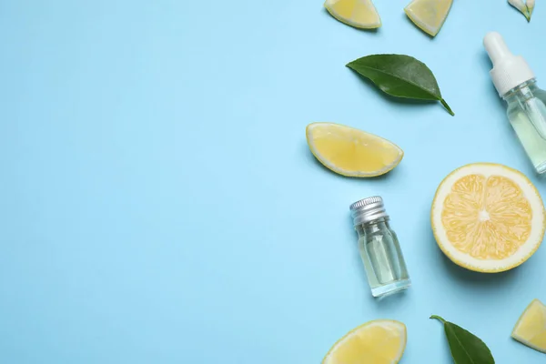 Flat Lay Composition Bottles Citrus Essential Oil Light Blue Background — ストック写真