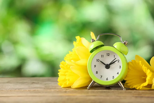 Alarm Clock Beautiful Spring Flowers Wooden Table Space Text Time — Stock Photo, Image